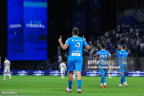 Aleksander Mitrovic of Al Hilal celebrates after scoring 2nd goal during the Saudi Pro League match between Al-Hilal and Al-Raed at Kingdom Arena on...