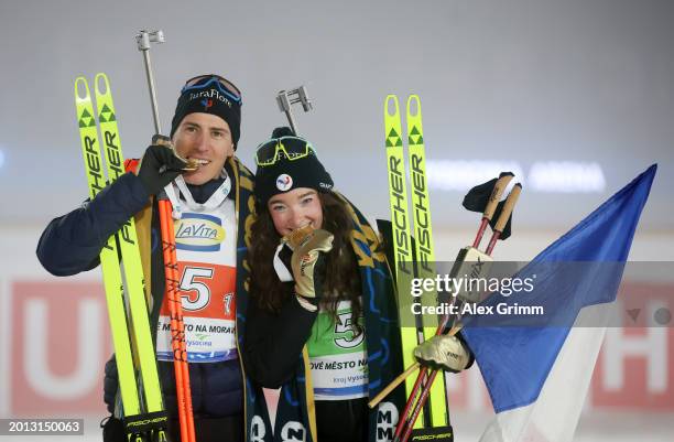 First placed Lou Jeanmonnot and Quentin Fillon Maillet of France celebrate following the Single Mixed Relay at the IBU World Championships Biathlon...