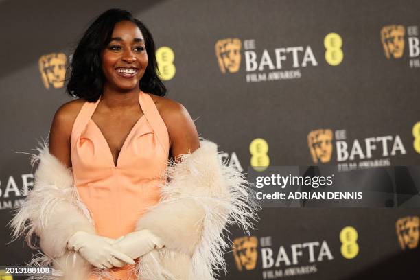 Actress, comedian and writer Ayo Edebiri poses on the red carpet upon arrival at the BAFTA British Academy Film Awards at the Royal Festival Hall,...