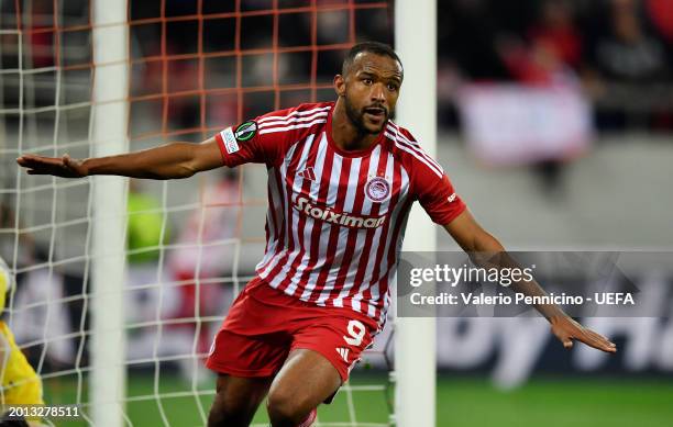 Ayoub El Kaabi of Olympiakos celebrates after scoring his team's first goal during the UEFA Europa Conference League 2023/24 Knockout Round Play-offs...