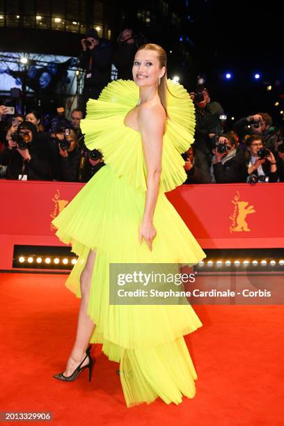 Toni Garrn, wearing H&M, attends the "Small Things Like These" premiere and Opening Red Carpet for the 74th Berlinale International Film Festival...