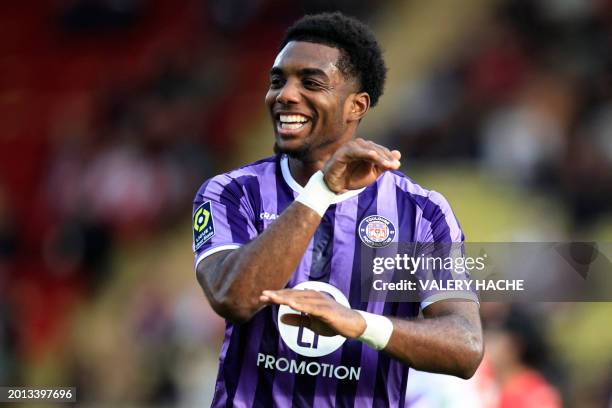 Toulouse's Cape Verdean defender Logan Costa celebrates after scoring a goal during the French L1 football match between AS Monaco and Toulouse FC at...