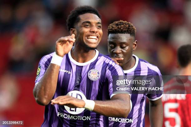 Toulouse's Cape Verdean defender Logan Costa celebrates after scoring a goal during the French L1 football match between AS Monaco and Toulouse FC at...