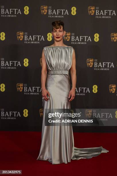 German actress Sandra Huller poses on the red carpet upon arrival at the BAFTA British Academy Film Awards at the Royal Festival Hall, Southbank...