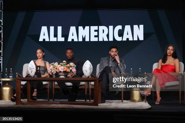 Bre-Z, Samantha Logan, Daniel Ezra, Michael Evans Behling and Grata Onieogou speak onstage at The CW presentation of "All American" during the 2024...