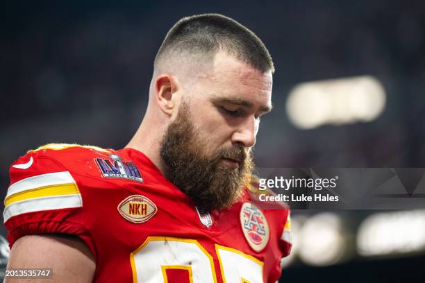 Tight end Travis Kelce of the Kansas City Chiefs walks off the field after the first half during Super Bowl LVIII against the San Francisco 49ers at...