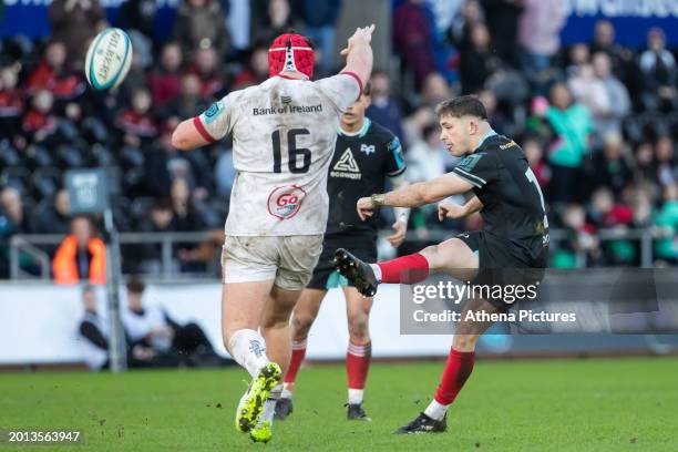Dan Edwards of Ospreys scores a drop kick during the United Rugby Championship match between the Ospreys and Ulster at Swansea.Com Stadium on...