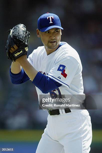 Chan Ho Park of the Texas Rangers comes to a set position on the mound during the game against the Seattle Mariners at the Ballpark in Arlington on...