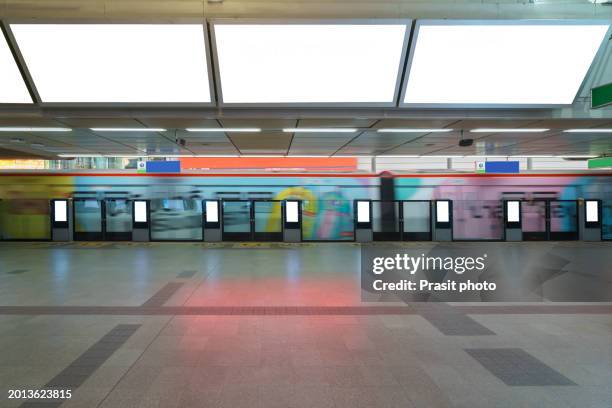 white billboard mock up is located on subway or train station to advertise - subway platform poster stock pictures, royalty-free photos & images