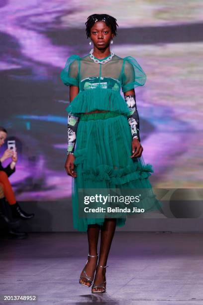 Model walks the runway during the Fashion Scout show during London Fashion Week February 2024 at Protein Studios on February 18, 2024 in London,...