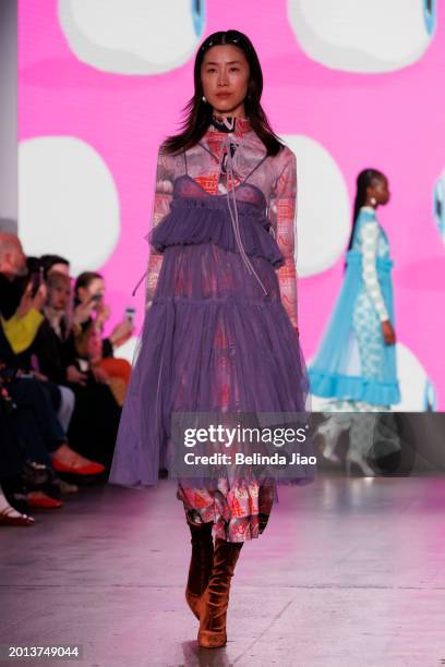 Model walks the runway during the Fashion Scout show during London Fashion Week February 2024 at Protein Studios on February 18, 2024 in London,...