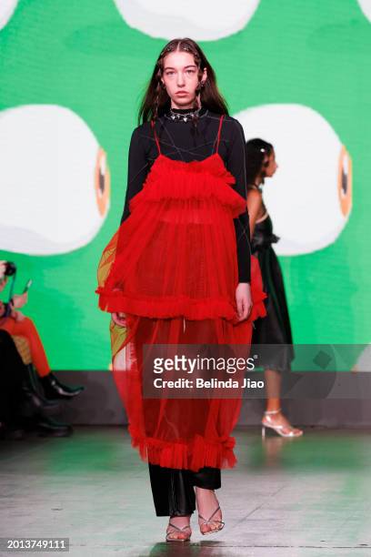 Model walks the runway during the Fashion Scout show during London Fashion Week February 2024 at Protein Studios on February 18, 2024 in London,...