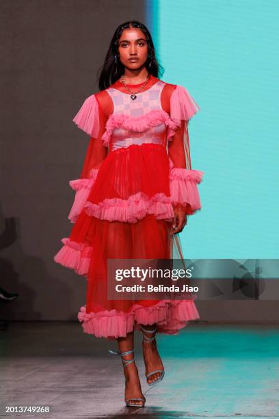 Model walks the runway during the Fashion Scout show during London Fashion Week February 2024 at Protein Studios on February 18, 2024 in London,...