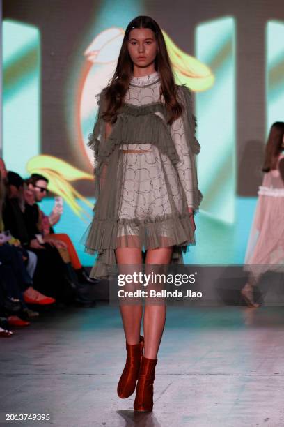 Model walks the runway during the Fashion Scout show during London Fashion Week February 2024 at Protein Studios on February 18, 2024 in London,...