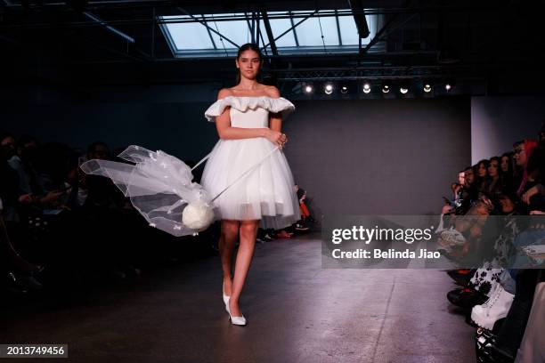 Model walks the runway during the Fashion Scout show during London Fashion Week February 2024 at Protein Studios on February 18, 2024 in London,...