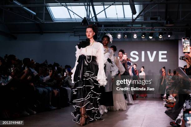 Models walks the runway during the Fashion Scout show during London Fashion Week February 2024 at Protein Studios on February 18, 2024 in London,...