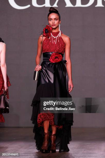 Model walks the runway during the Fashion Scout show during London Fashion Week February 2024 at Protein Studios on February 18, 2024 in London,...