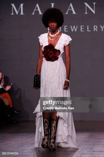 Model walks the runway during the Fashion Scout show during London Fashion Week February 2024 at Protein Studios on February 18, 2024 in London,...