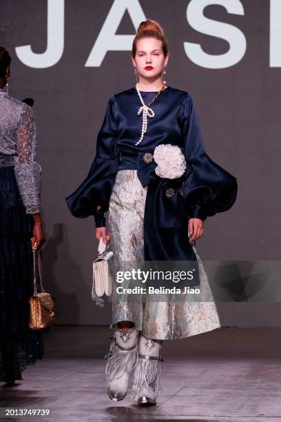 Model walks the runway during the Fashion Scout show during London Fashion Week February 2024 at Protein Studios on February 18, 2024 in London,...