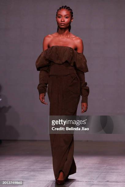 Model walks the runway during the Fashion Scout show during London Fashion Week February 2024 at Protein Studios on February 18, 2024 in London,...