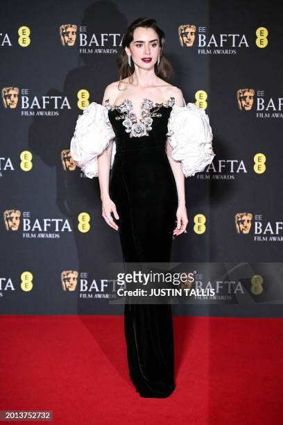 British actress Lily Collins poses in the Winners Room during the BAFTA British Academy Film Awards ceremony at the Royal Festival Hall, Southbank...