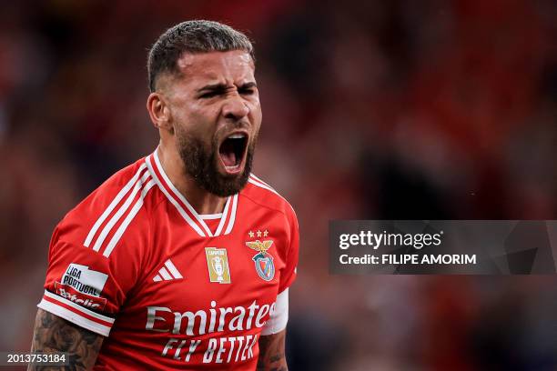 Benfica's Argentinian defender Nicolas Otamendi celebrates after scoring his team's second goal during the Portuguese league football match between...