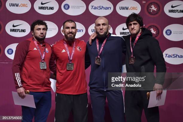 Feyzullah Akturk of Turkyie wins the gold medal, Boris Makoev wins the silver medal, Miriami Maisuradze of Georgia and Magomed Kurbanov Independent...