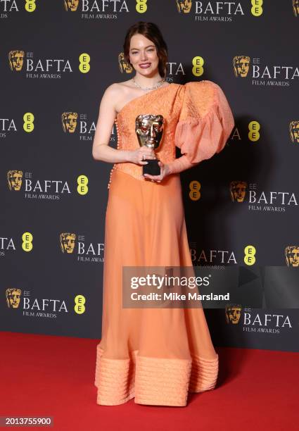 Emma Stone poses in the winners room at the 2024 EE BAFTA Film Awards at The Royal Festival Hall on February 18, 2024 in London, England.