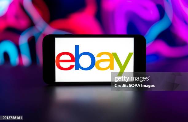 In this photo illustration, the eBay logo is seen displayed on a mobile phone screen.