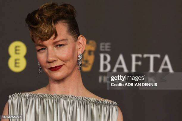 German actress Sandra Huller poses on the red carpet upon arrival at the BAFTA British Academy Film Awards at the Royal Festival Hall, Southbank...