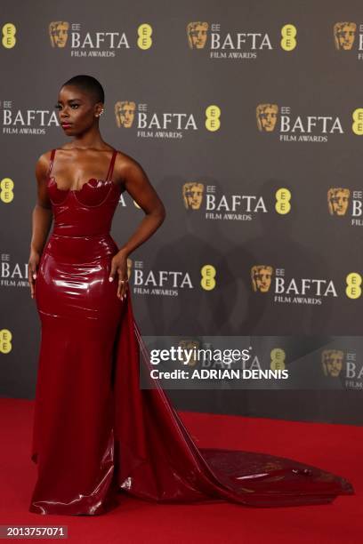 Actress Joy Sunday poses on the red carpet upon arrival at the BAFTA British Academy Film Awards at the Royal Festival Hall, Southbank Centre, in...