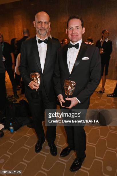 James Wilson and Johnnie Burn, winners of the Sound Award for 'The Zone of Interest', pose backstage during the EE BAFTA Film Awards 2024 at The...