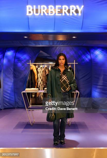 Tina Kunakey attends the Burberry Turns Harrods Knight Blue: Pre-Show Cocktail event before the Burberry London Fashion Week show at Harrods on...