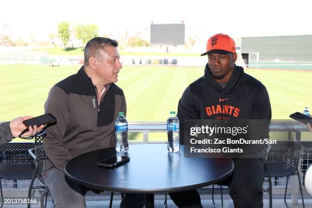 Erwin Higueros and Jorge Soler of the San Francisco Giants meets with media during a press conference at Scottsdale Stadium on February 18, 2024 in...