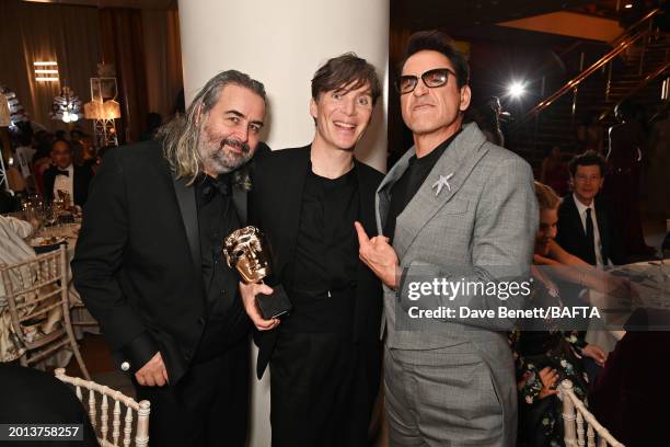 Hoyte van Hoytema, Cillian Murphy and Robert Downey Jr. Attend the EE BAFTA Film Awards 2024 Dinner at The Royal Festival Hall on February 18, 2024...