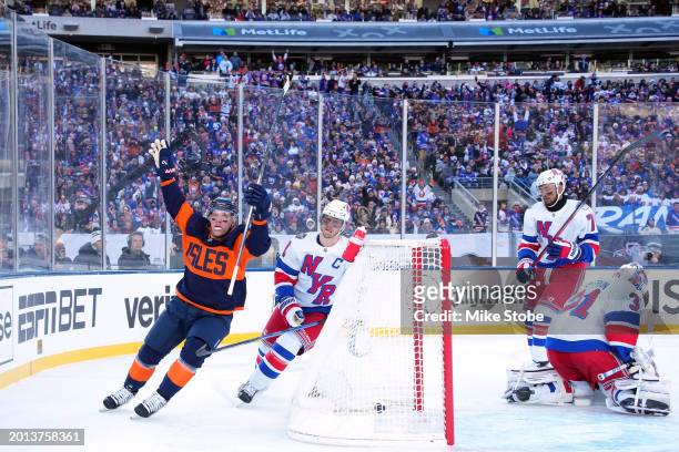 Bo Horvat of the New York Islanders celebrates after scoring a goal past Igor Shesterkin of the New York Rangers during the first period during the...