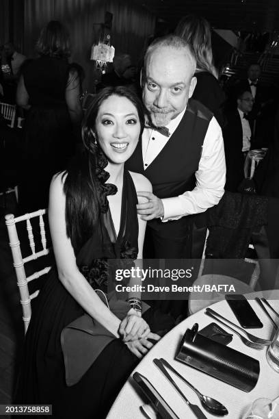 Clara Wong and Paul Giamatti attend the EE BAFTA Film Awards 2024 Dinner at The Royal Festival Hall on February 18, 2024 in London, England.