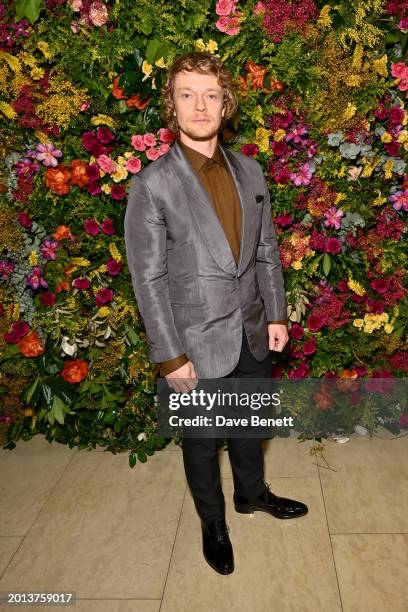 Alfie Allen attends the British Vogue And Tiffany & Co. Celebrate Fashion And Film Party 2024 at Annabel's on February 18, 2024 in London, England.