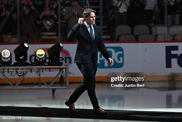 Jaromir Jagr walks out to the ice for his jersey retirement ceremony before the game between the Pittsburgh Penguins and the Los Angeles Kings at PPG...