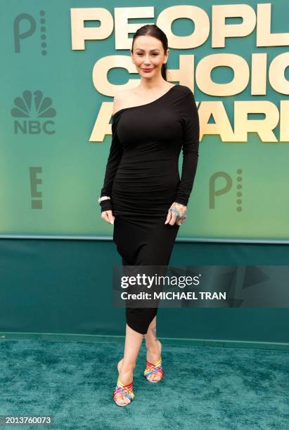 Personality Jenni "JWoww" Farley arrivse for the 2024 People's Choice awards at the Barker Hangar in Santa Monica, California, February 18, 2024.