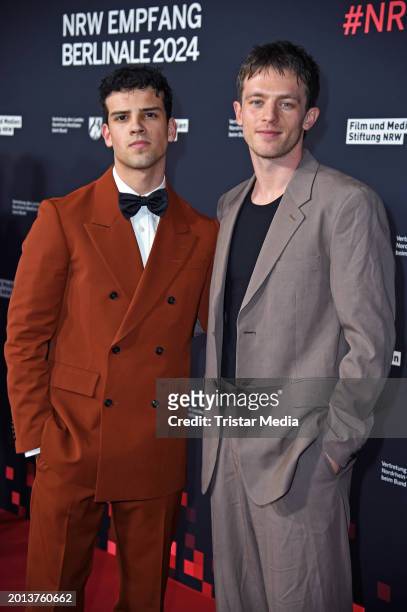 Ilyes Raoul Moutaoukkil and Jannis Niewoehner attend the NRW Reception on the occasion of the 74th Berlinale International Film Festival Berlin at...
