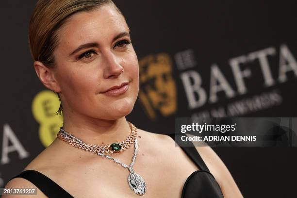 Film director and screenwriter Greta Gerwig poses on the red carpet upon arrival at the BAFTA British Academy Film Awards at the Royal Festival Hall,...