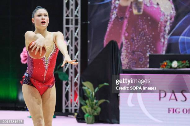 Milena Baldassarri of the Ginnastica Fabriano team competes with the ball during the 1st round of the Italian National Series A1 Rhythmic Gymnastics...