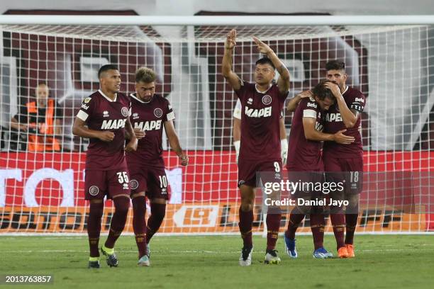 Walter Bou of Lanus celebrates with teammates after scoring the team´s first goal during a Copa de la Liga 2024 group B match between Lanus and Boca...