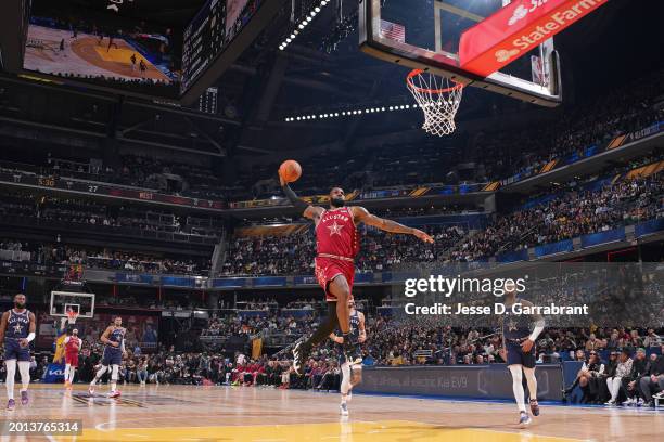 LeBron James of the Western Conference dunks the ball during the NBA All-Star Game as part of NBA All-Star Weekend on Sunday, February 18, 2024 at...