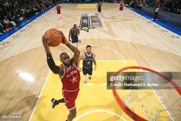 LeBron James of the Western Conference drives to the basket during the game against the Eastern Conference during the NBA All-Star Game as part of...