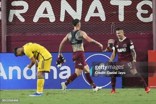 Augusto Lotti of Lanus celebrates with teammate Ramiro Carrera after scoring the team´s second goal during a Copa de la Liga 2024 group B match...
