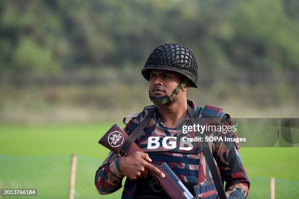 Member of the Border Guard Bangladesh stands on guard in the Naikhongchori area near the Bangladesh-Myanmar border in the Bandarban district of...