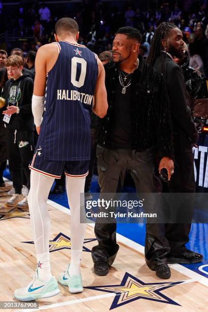 Tyrese Haliburton of the Eastern Conference and Chris Tucker embrace after the NBA All-Star Game as part of NBA All-Star Weekend on Sunday, February...