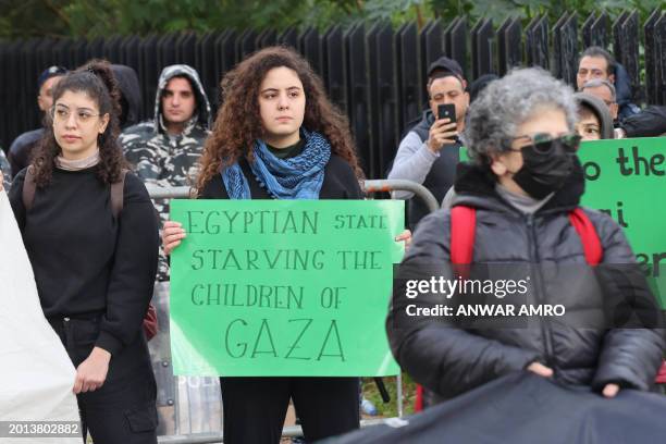 Lebanese activists block the road leading to the Egyptian embassy in Beirut in protest against the closure of the Rafah crossing between Egypt and...